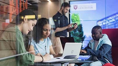 students with laptop