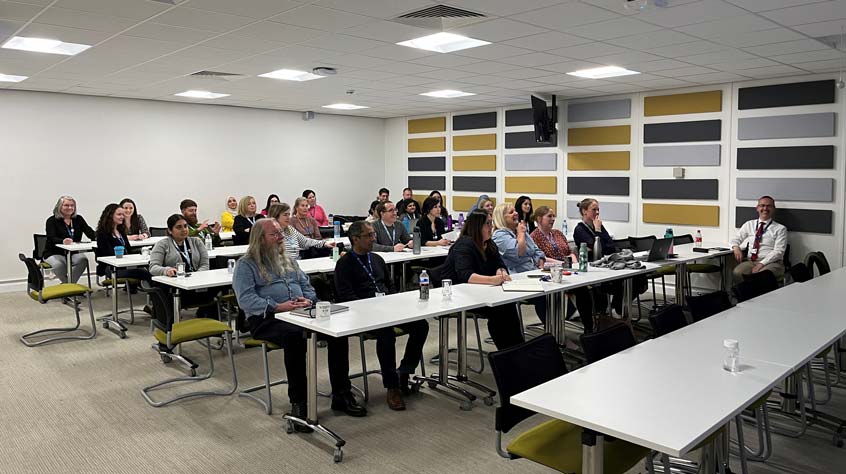 LCTU members sitting in a room on Leicester campus