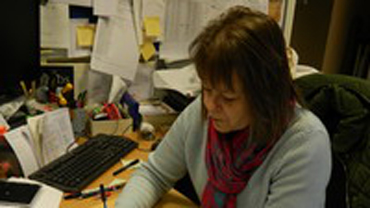 Heidi Addison working at a desk