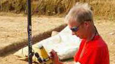 Jamie Patrick working at a dig site
