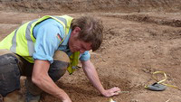 Steve Baker working at a dig site