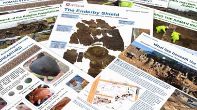 A number of publications fanned out on a table.