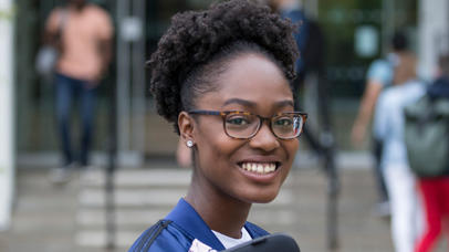Smiling student outside campus at Brookfield