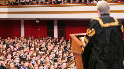 Speaker on stage at graduation