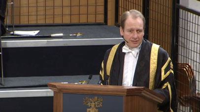 Vice-chancellor at podium at graduation ceremony