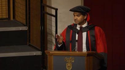 Speaker in robes at graduation