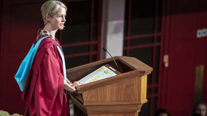Woman giving a speech at the ceremony at De Montfort Hall