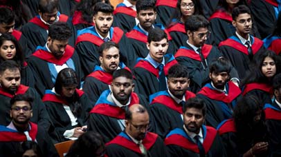 A view of the students during the ceremony at De Montfort Hall