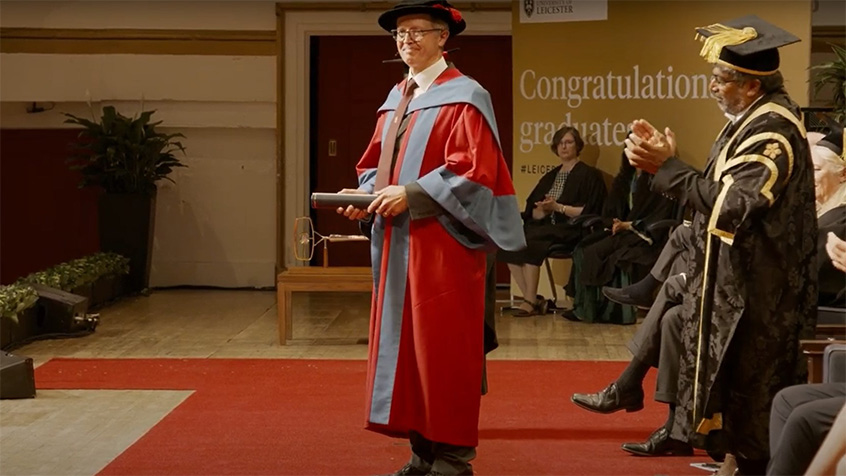 Dr Nigel Hewett OBE receiving an Honorary Degree at the University of Leicester