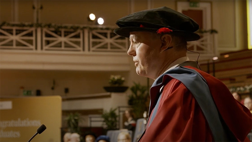 Professor Chris Witty receiving an Honorary Degree at the University of Leicester