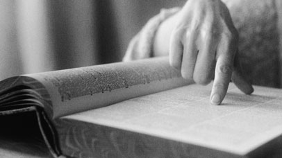 Hand on a dictionary