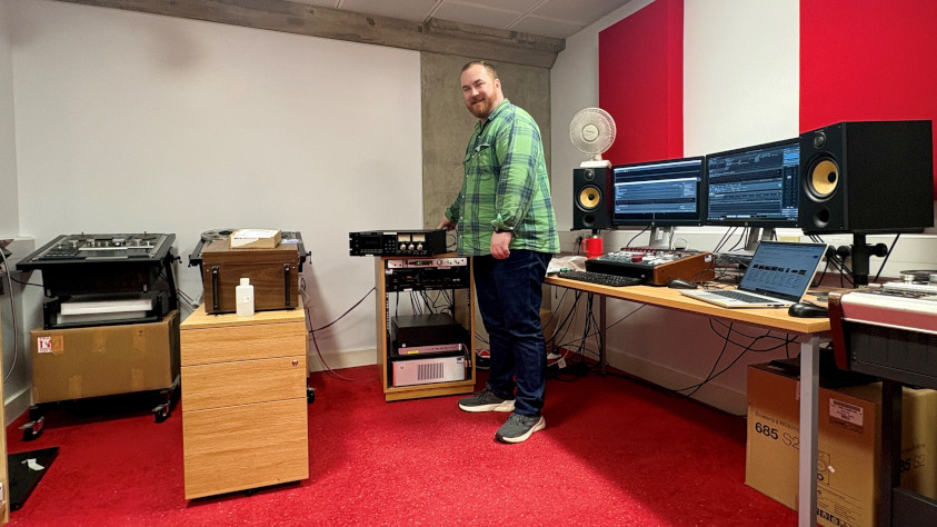 Picture of engineer in audio recording studio