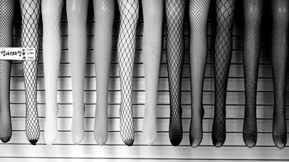 Mannequin legs lined up wearing different stockings