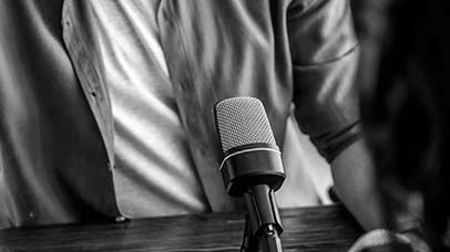 person being recorded at a desk