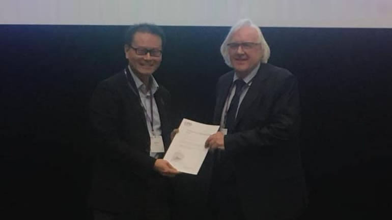 Professor Stephen Wood receiving award