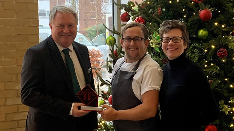 College Court staff accepting an award