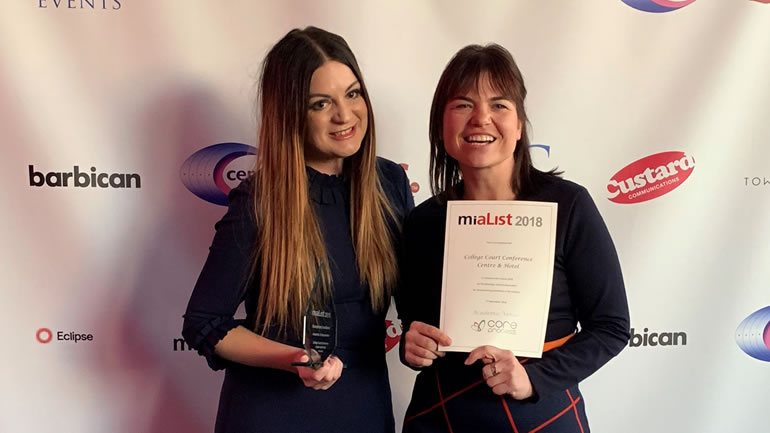 College Court staff showing off their award
