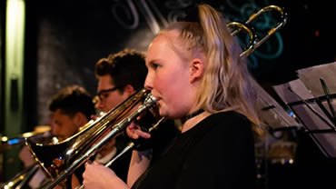 Woman playing trumpet