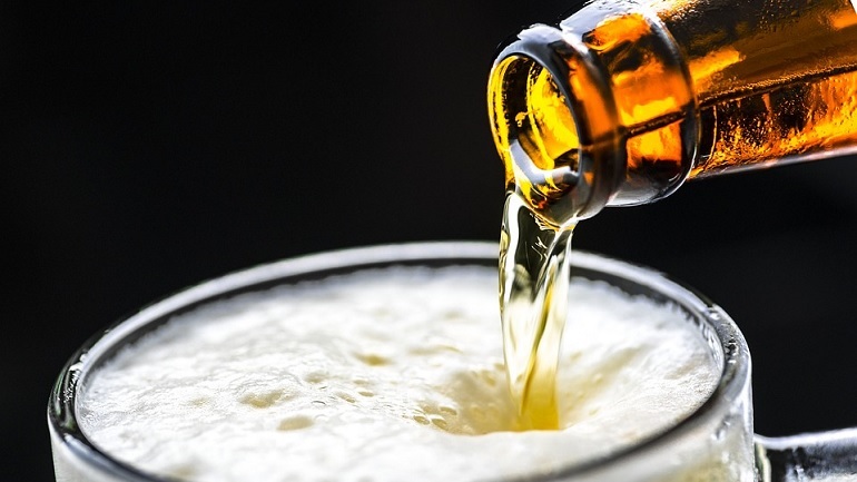 Beer being poured into glass