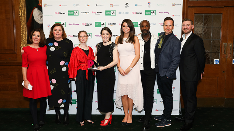 Members of the team collecting their award