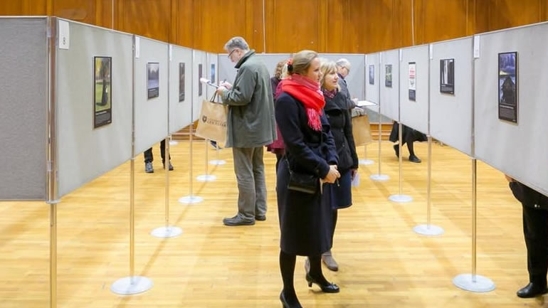 People viewing images in a gallery