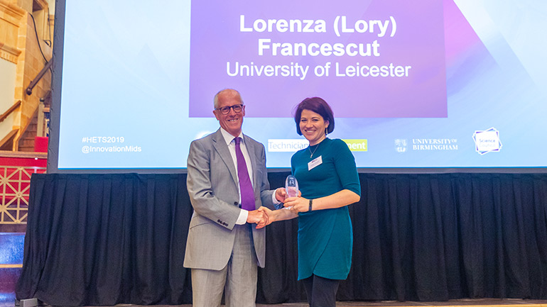 Lory Francescut receiving her award
