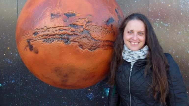 Leicester scientist Dr Beatriz Sánchez-Cano with a model of Mars.