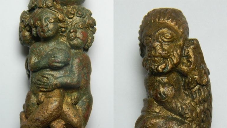 Detail of an elaborately-decorated Roman bronze key handle portraying the execution of captives in the arena by throwing them to lions.