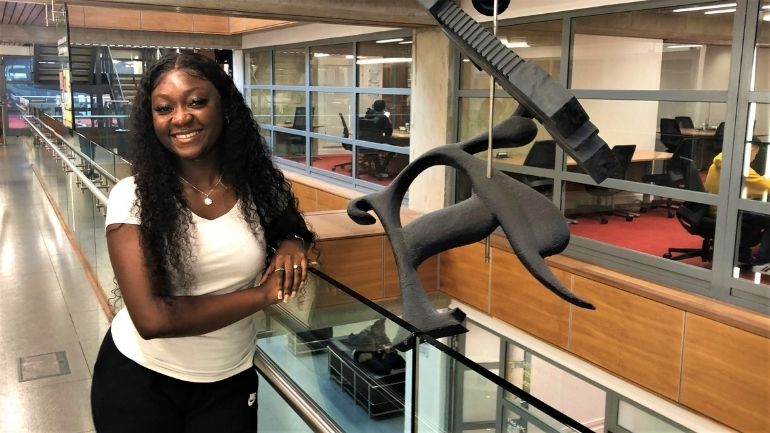 Kesiah Gakpe in the David Wilson Library.
