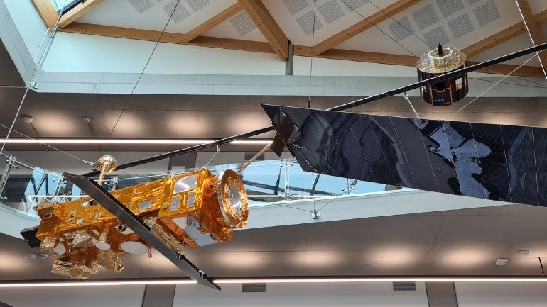 One medium-sized and one small satellite hung from the ceiling of the Space Park Leicester atrium.
