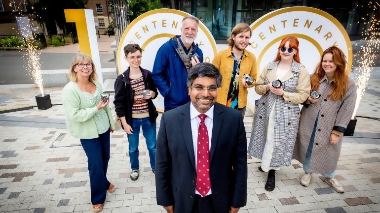 Professor Nishan Canagarajah with students and staff at the launch of the University's Centenary celebrations.