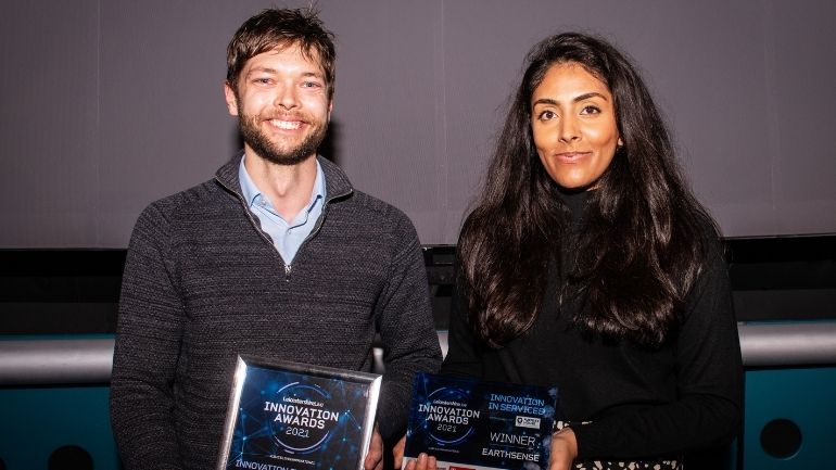 Members of the EarthSense team pose with their award for Innovator of the Year.