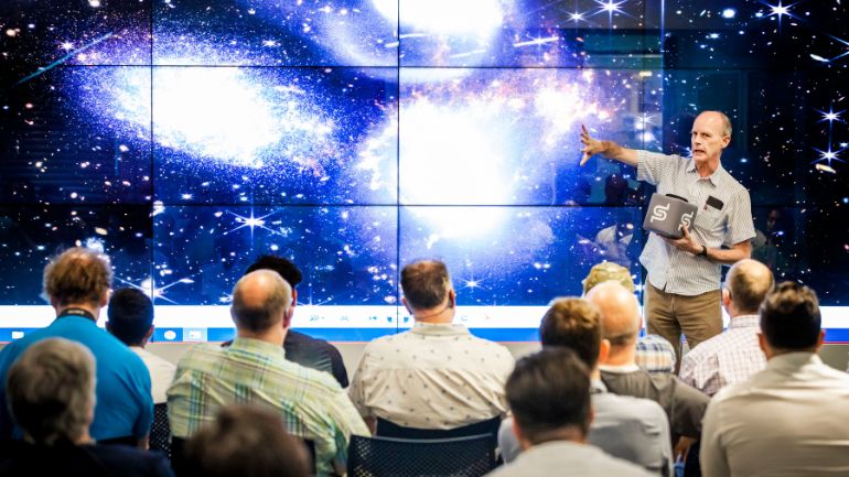 Professor Paul O'Brien presents to an audience at Space Park Leicester.