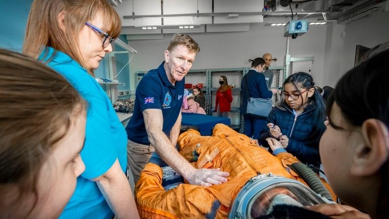 Tim Peake with schoolchildren at the opening of Space Park Leicester.