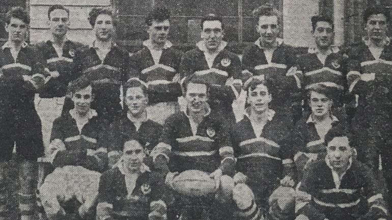 Black and white team photograph of the University of Leicester's men's rugby team in 1950.