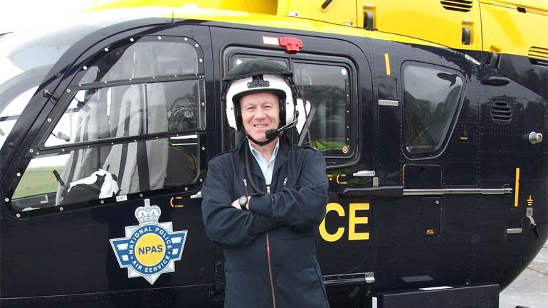 Dr Simon Bennett preparing to fly with the National Police Air Service on an operational mission