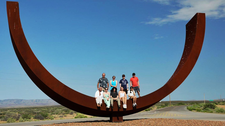 The whole team admiring the artwork on the way to Spaceport America.