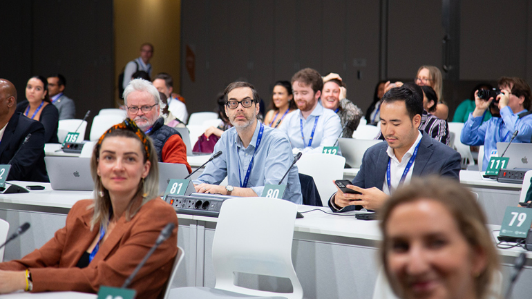 Tim Neff in a delegation hall at COP28
