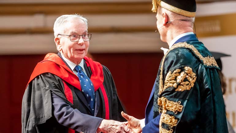 Stan shakes hands with Chancellor, Lord David Willets