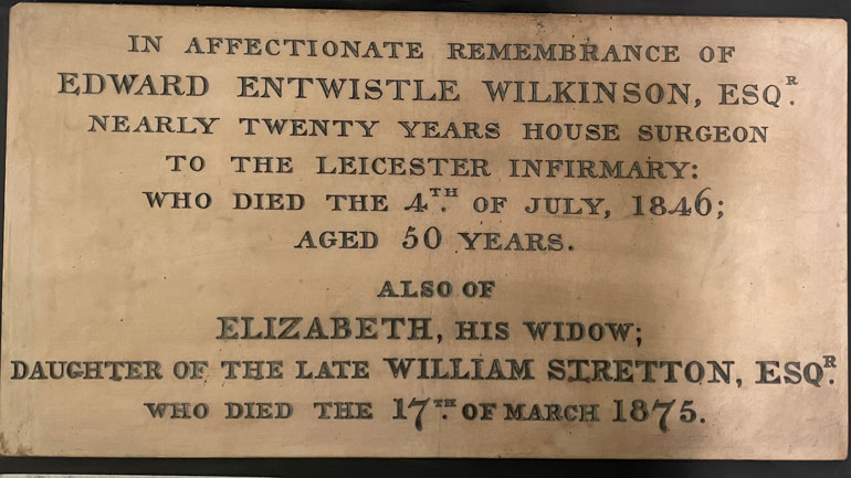 The memorial plaque for Edward and Elizabeth Wilkinson on the wall in the South Aisle of the Cathedral. Image: ULAS