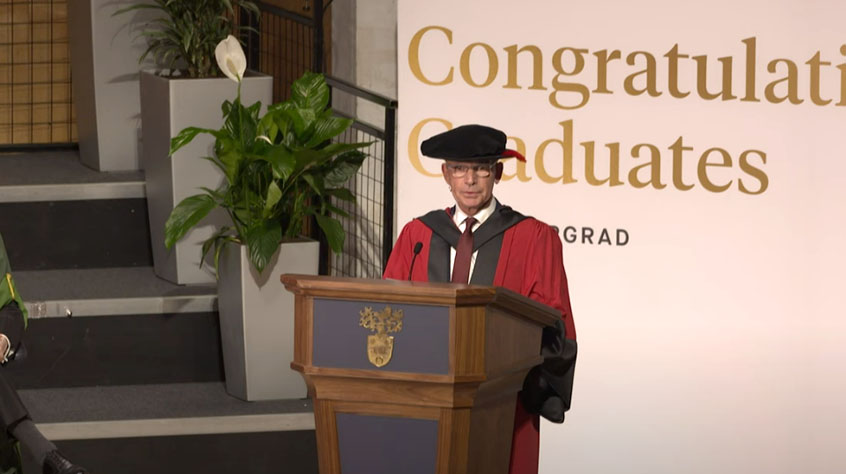 David Moore receives award Honorary Doctorate of Laws during a graduation ceremony