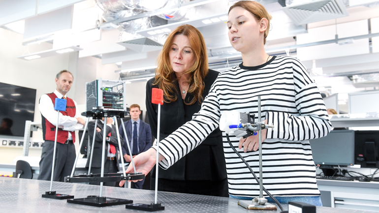 Gillian Keegan views a demonstration in the Space Park Leicester labs.