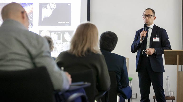 Professor Richard Ambrosi speaking at an event.