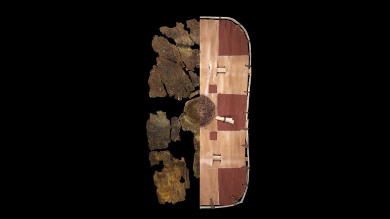 Composite of original and reconstructed Enderby Shield. The shield is rectangular with rounded edges and has a crossed pattern with a circle in the middle.