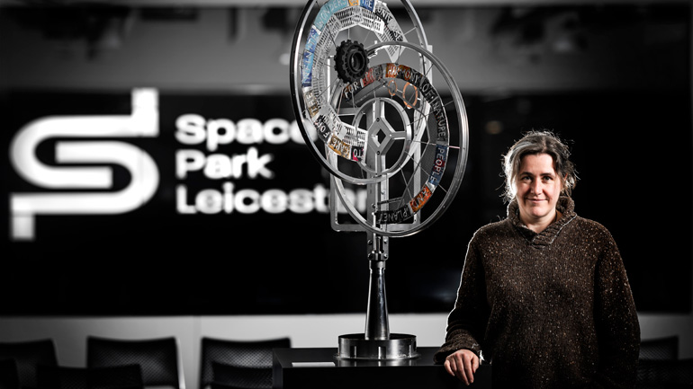 Michelle Reader with her new sculpture at Space Park Leicester.