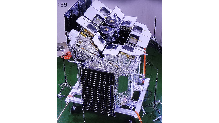 The Einstein Probe satellite undergoing tests at the MicroSat institute of CAS in Shanghai. The twelve modules of the Wide-field X-ray telescope can be seen mounted on the top of the spacecraft. Each module points in a different direction to provide the wide field of view (Credit: CAS)