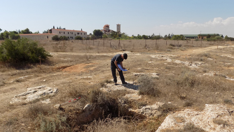 ULAS Archaeologist Matt Beamish recording a probable Byzantine period tomb near Xylotymbou. © ULAS, University of Leicester