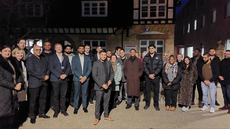 Anuj Ashar with friends, colleagues and University staff at the launch event of his new office space at the University.
