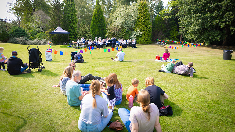 Visitors enjoy the leafy surroundings of the Botanic Garden.