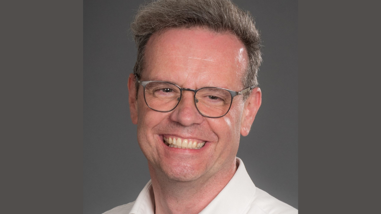 Ross Parry headshot, smiling at the camera